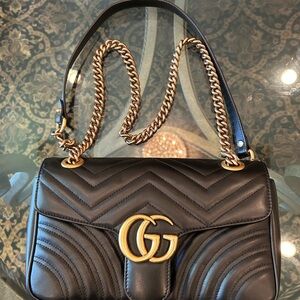 Luxurious Black Quilted Crossbody Bag with Gold Accents